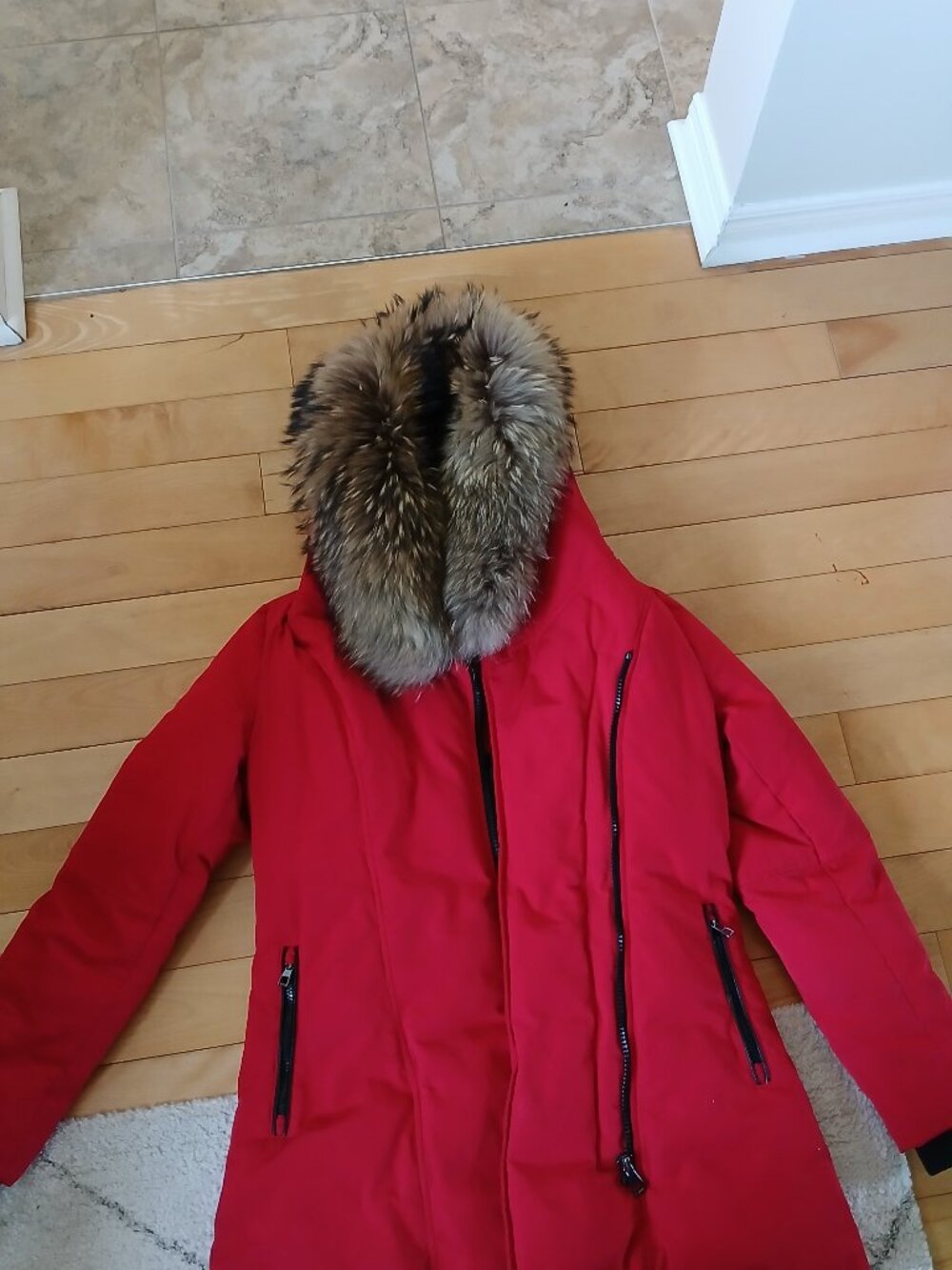 Red winter coat with genuine fur collar for women